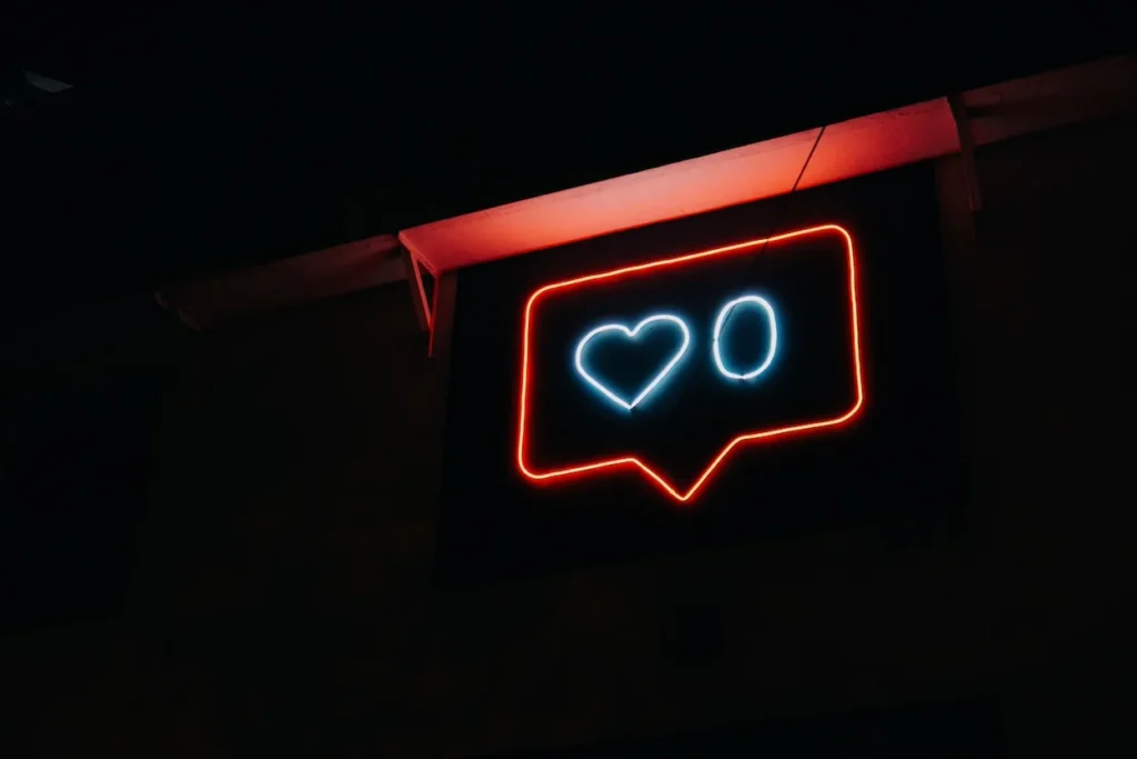 neon light social media heart (like)